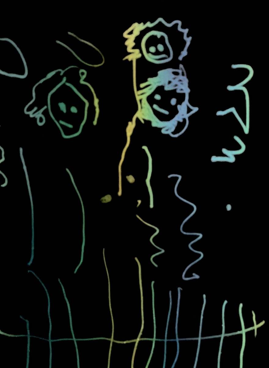 Two simple face outlines are etched in the dark surface, with wavy lines representing hair and other shapes around them. Below the faces, a series of vertical lines stand above a horizontal line, resembling a fence or gate.